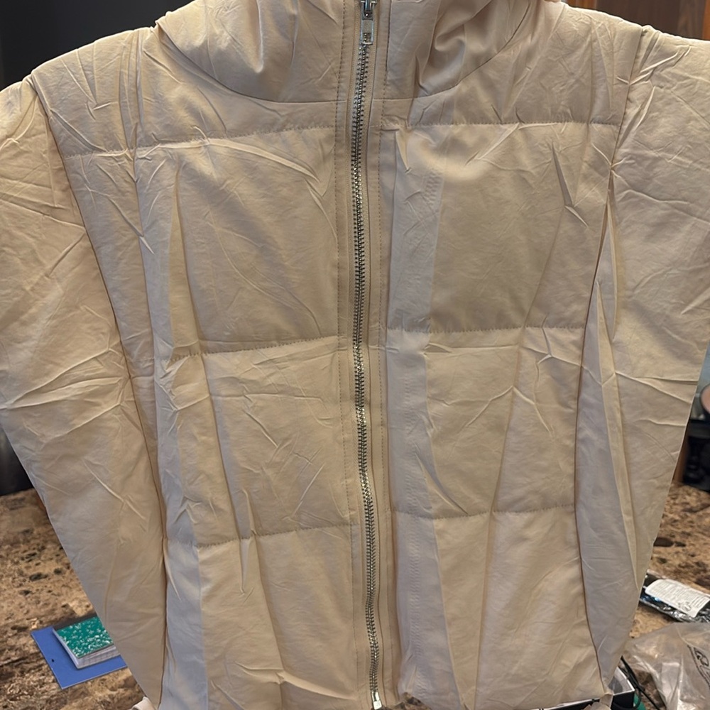 White womens puffer vest